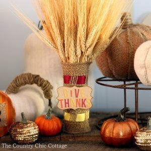 Burlap wrapped wheat for your fall home decor. Learn how to weave burlap with ribbon for a fun craft technique that you will use over and over!