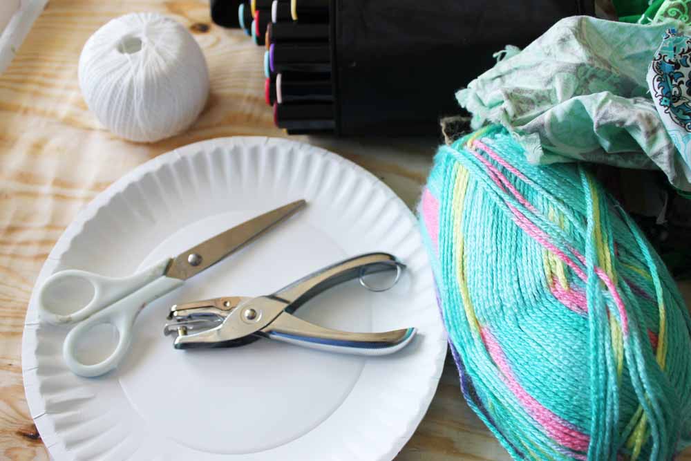 Here are the supplies you need to make a paper plate kite