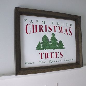 farm fresh christmas trees sign on wood