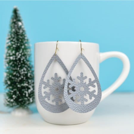 snowflake earrings cut on a cricut