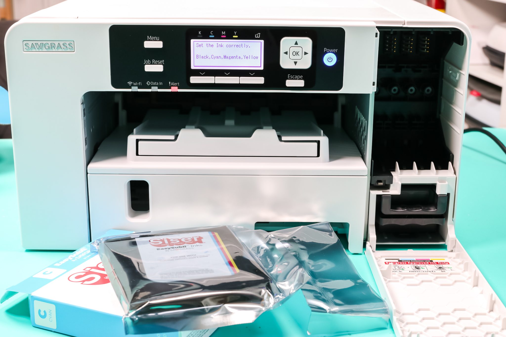 Sublimation printer with ink out of the boxes.