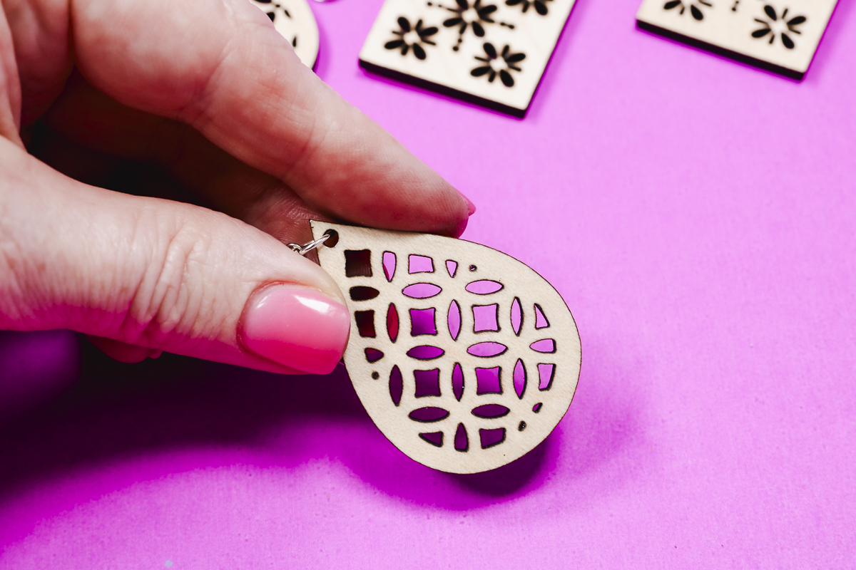 Light Maple Plywood Glowforge earring close up.