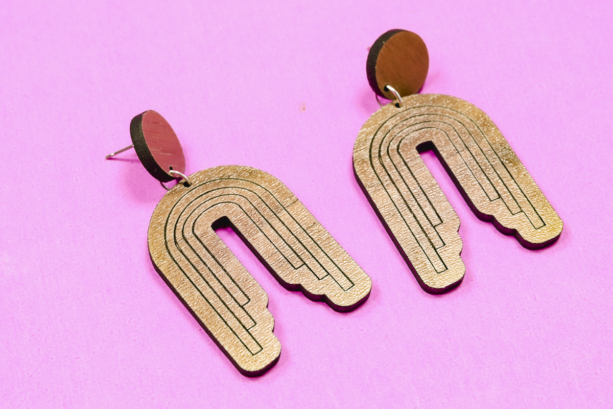 Cut and scored earrings with Glowforge Spark laser.