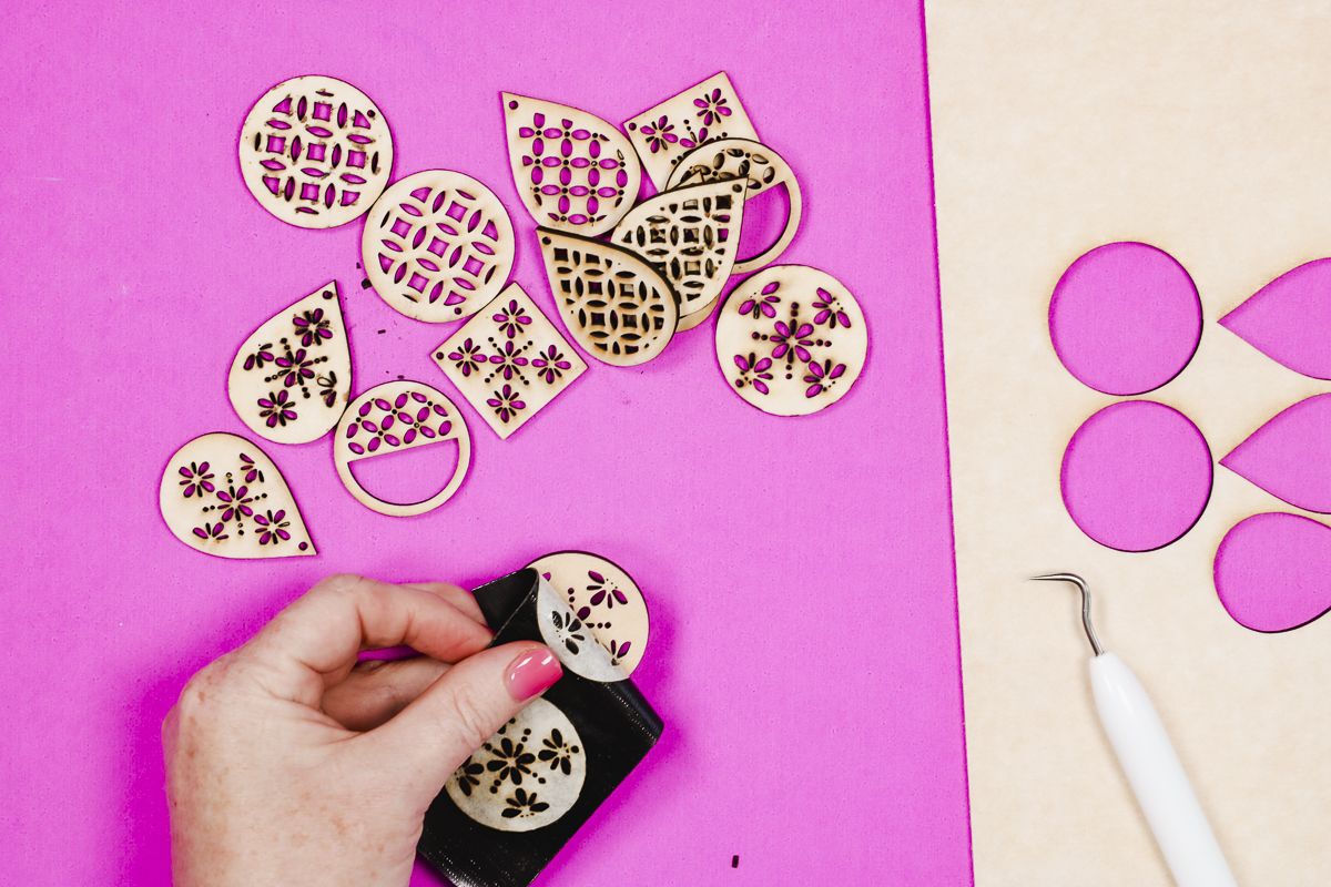 Use strong grip tape to remove masking from earrings.