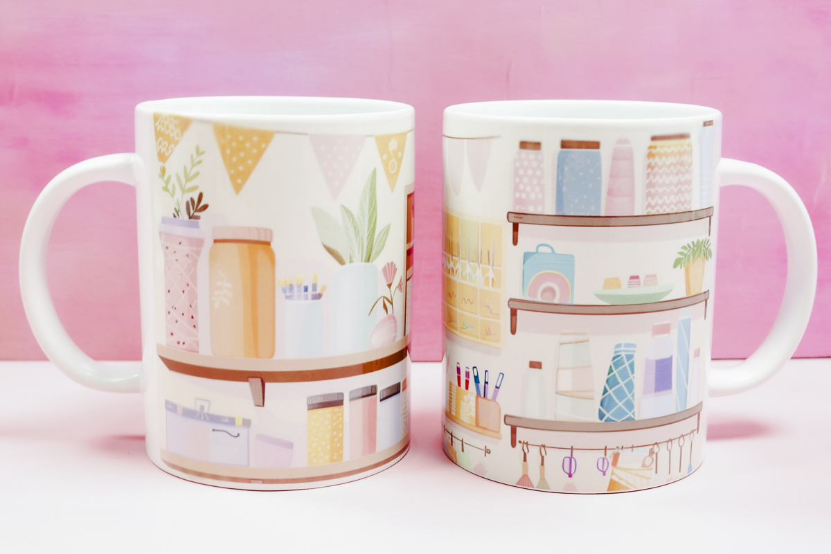 Finished sublimation mugs with craft room designs.