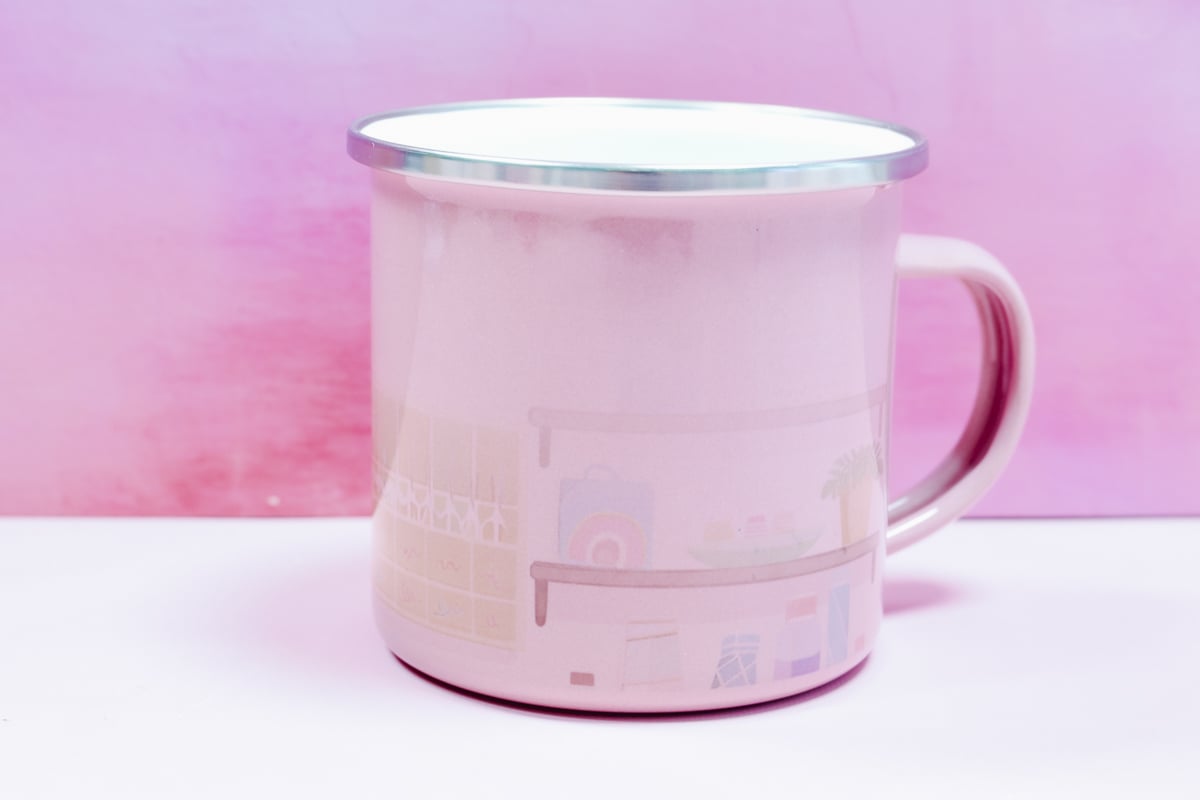 Sublimation camp mug with uneven sublimation print.
