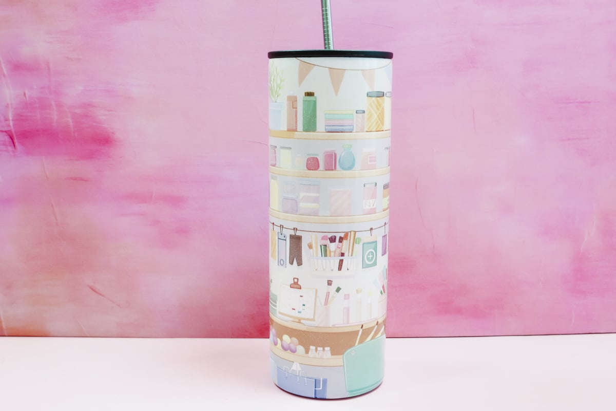 Finished 20-ounce skinny tumbler with craft room design.