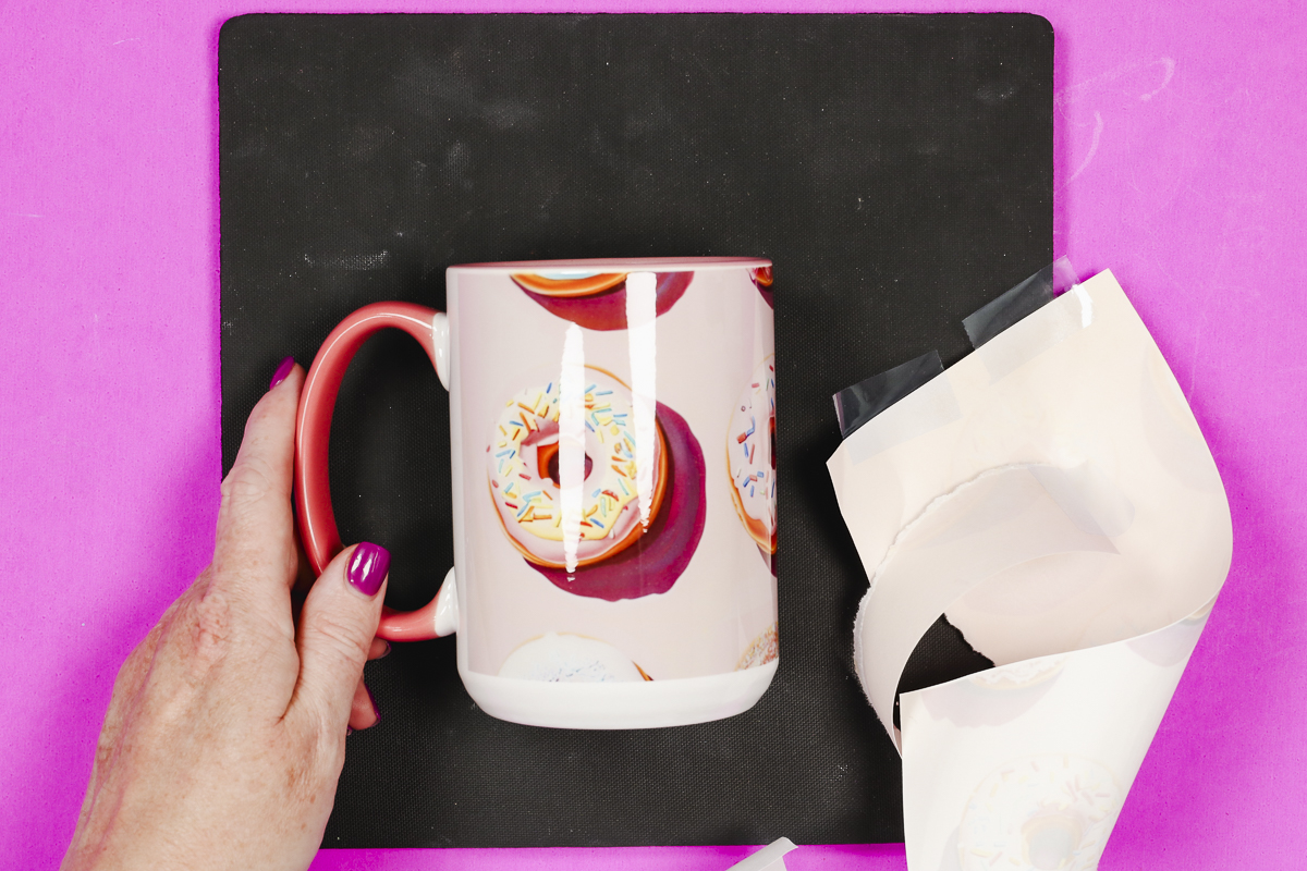 Remove sublimation print from mug.