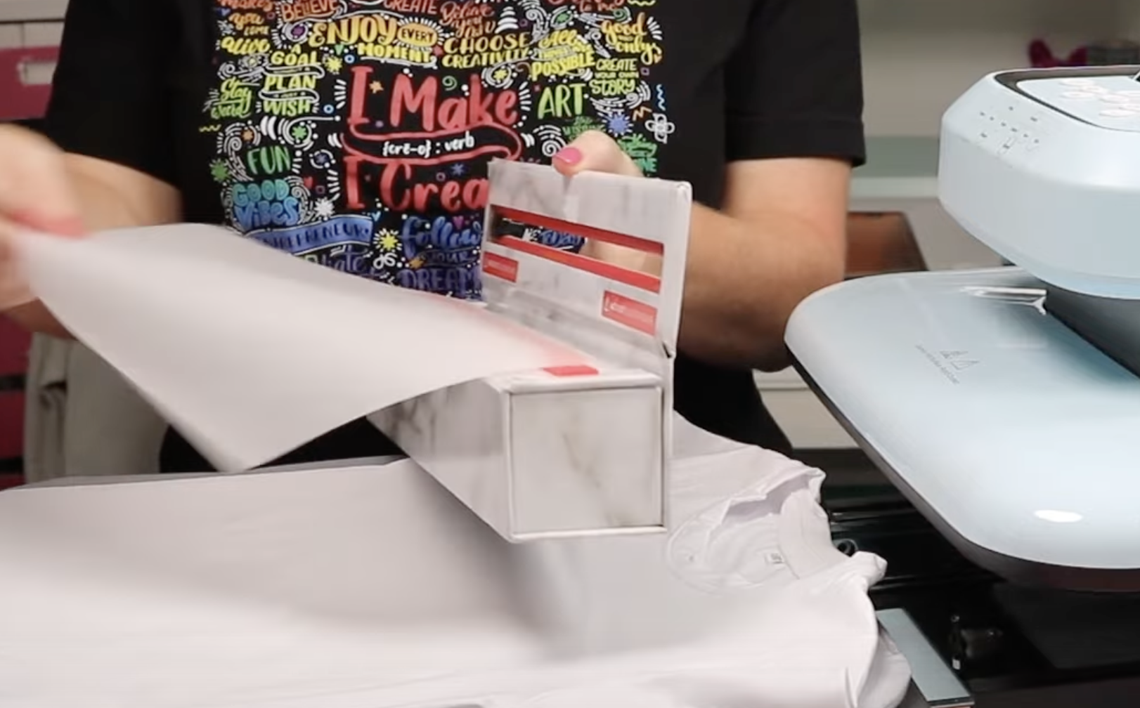 Add protective paper inside shirt and on top of print.